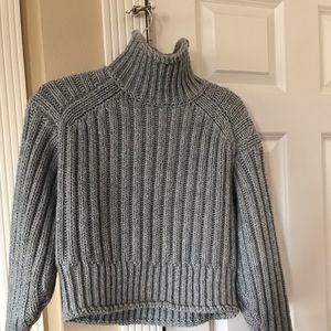 Turtleneck sweater. Perfect shape.  Never put in dryer.  Waist length.
